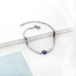Chic stainless steel snake chain bracelet featuring a blue opal evil eye charm centerpiece