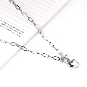 Polished silver heart pendant necklace with toggle clasp on oval link chain