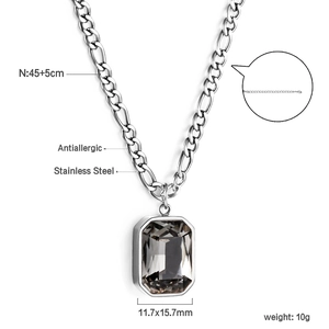 Detail view of silver stainless steel necklace with grey rectangular gemstone pendant