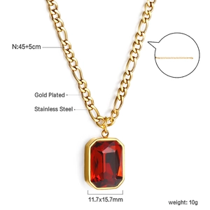 Detail view of gold-plated stainless steel necklace with 11.7x15.7mm red gemstone pendant