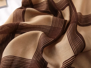 Macro shot of fine textile texture and wave pattern on cotton-linen feel scarf