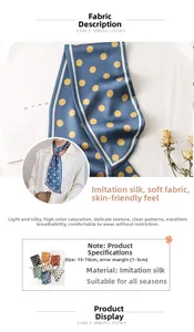 Vue détaillée d'un foulard en soie synthétique bleu marine à pois avec bordure contrastée