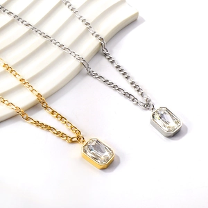 Vintage rectangular crystal pendant necklaces in gold and silver with Figaro chains