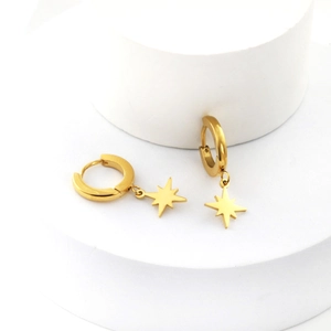 Elegant gold octagonal star dangle earrings with polished round hoops on white display