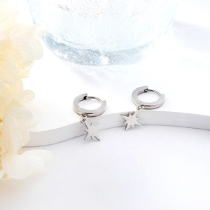 Minimalist silver North Star hoop earrings with star pendants for a stylish look