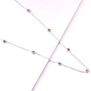 Minimalist silver chain necklace with multi-colored bezel-set round gemstones for women