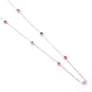 Detail view of silver chain necklace with multi-colored bezel-set round crystals