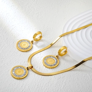 Gold stainless steel coin necklace and earrings set with white zircon stones