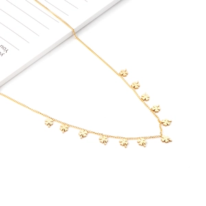 Minimalist gold stainless steel clover tassel necklace with multiple small clover charms