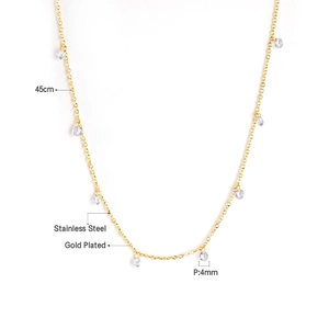 Macro detail of a 45cm gold plated stainless steel necklace with 4mm zircon pendants