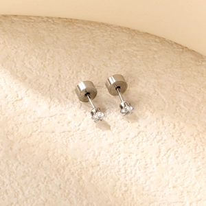 Boucles d'oreilles en acier inoxydable avec zircon rond et fermoir plat sécurisé argenté