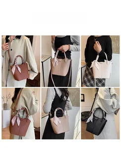 Litchi pattern bucket bag details showing crossbody and handbag styles with silk scarf handle