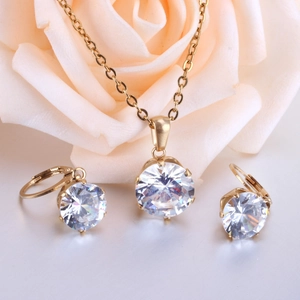 Elegant six-prong solitaire diamond necklace and earring jewelry set in gold finish