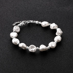 Baroque pearl bracelet with stainless steel beads and adjustable lobster clasp closure