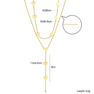 Collana a doppio strato in acciaio inossidabile dorato con pendenti a cuore e design a Y