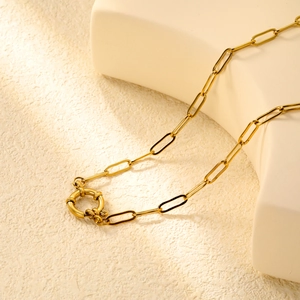 Detail of 18K gold plated paperclip chain necklace with round spring ring clasp