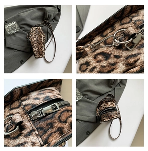 Macro view of leopard print PU leather coffin bag with silver rivets and metal zipper