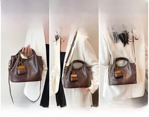 Three-way carry style for dark brown leather handbag: tote, shoulder, and crossbody view