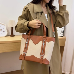 Retro color-block tote bag in cream and caramel with double zippers and top handle