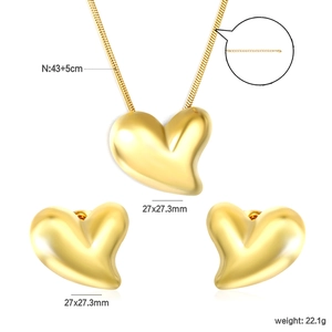 Polished gold heart jewelry set with necklace and earrings including size dimensions