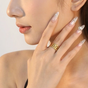 Golden woven mesh ring for women with minimalist adjustable open band on model