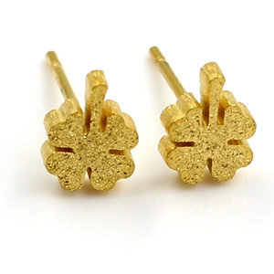 Elegant gold clover stud earrings with a matte sandblasted finish on a white background