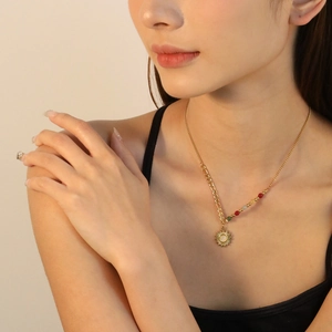 Vintage gold sun pendant necklace with colorful beads and white center stone for women