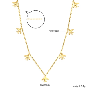 Detail of gold plane necklace showing 40+5cm length and 8.2x9mm aircraft charms