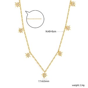 Gold eight-point star pendant necklace with cubic zirconia insets and adjustable chain