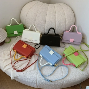 Luxurious contrast color leather crossbody handbags set with unique wavy handles