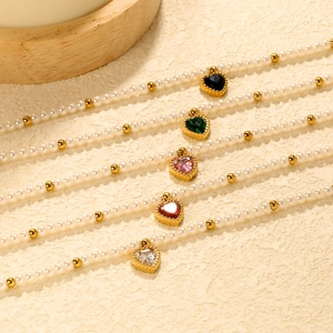 Elegant pearl bracelets with heart zircon pendants in five colors and gold accents