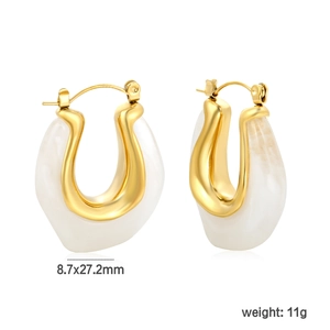 Detailed close-up of U-shaped resin earrings with marble pattern and gold metal