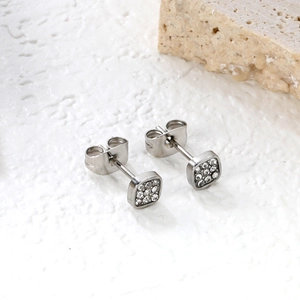 Elegant square pave stud earrings in silver steel with sparkling crystals on stone base