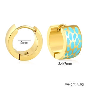 Detail view of gold hoop earrings with blue spotted pattern and 9mm inner diameter