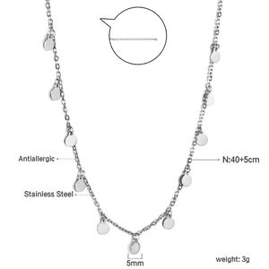 Detailed close-up of antiallergic stainless steel silver chain with a round disc pendant