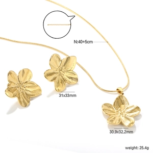 Golden sun flower jewelry set with hollow petal necklace and matching stud earrings