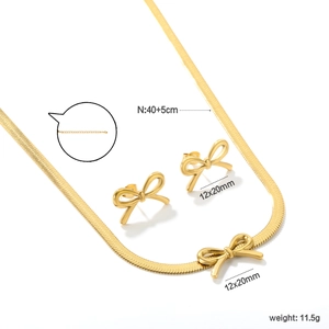 Golden stainless steel jewelry set featuring bow-knot necklace and stud earrings