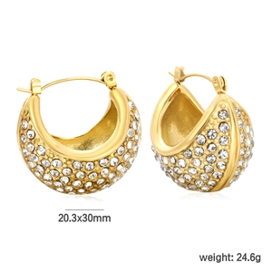 Macro detail of gold-finish C-shaped hoop earrings with inlaid white crystals and dimensions