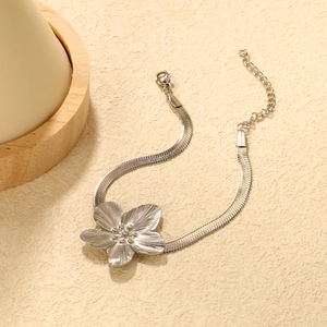 Detailed view of silver petal flower bracelet with a sleek snake chain and lobster clasp
