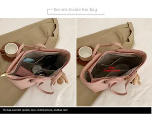 Vista interna della grande borsa tote che mostra lo spazioso scomparto principale e tasche
