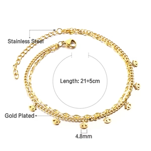 Dettaglio della cavigliera a doppio strato placcata oro 18K con ciondoli Evil Eye