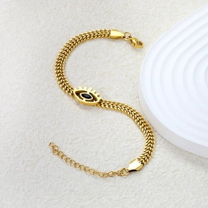 Gold stainless steel evil eye bracelet with chunky chain and black gemstone inlay