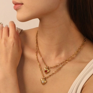 Double-layered 18k gold stainless steel lava heart necklace with red and clear gemstones