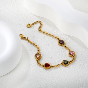 Bracelet cœur en pierres colorées et acier inoxydable doré avec fermoir mousqueton