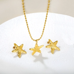 Golden starfish pendant necklace and stud earrings jewelry set with spiral texture
