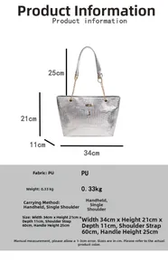 Detail of silver crocodile-embossed tote bag featuring a deer charm and chain detail