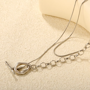 Silver double chain necklace with toggle clasp and oval pendant in polished finish