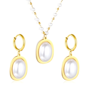 Elegant gold-plated jewelry set with oval pearls including necklace and drop earrings