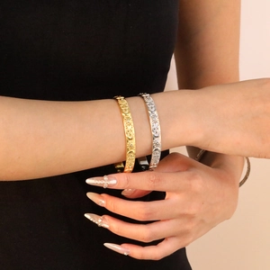 Bracelets ouverts en or 18 carats et argent avec motifs soleil, lune, et étoiles et cristaux