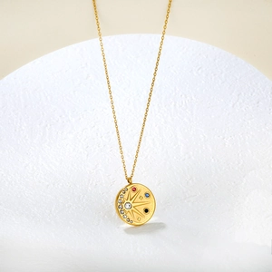 Golden North Star circular pendant necklace with colorful crystals and 18K gold plating